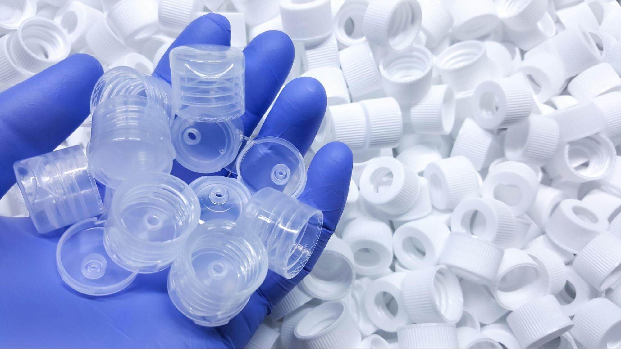 Threaded cap parts made with injection molding for the medical industry.